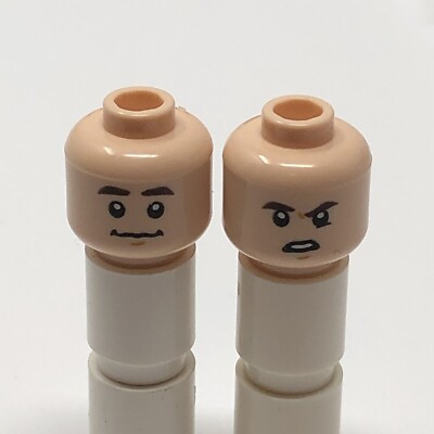 LEGO Minifig Dual Head Neutral Confused Expression Lowered Left Brown Eyebrow