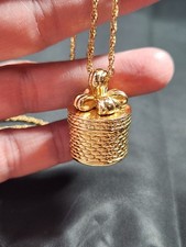 Vintage Joan Rivers golden basket gift bow pe...