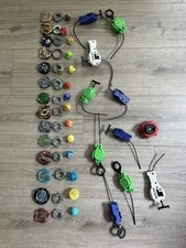 Beyblades - Lot Of 53 pcs Mixed Metal Pieces, Rip Cords  Launchers Hasbro
