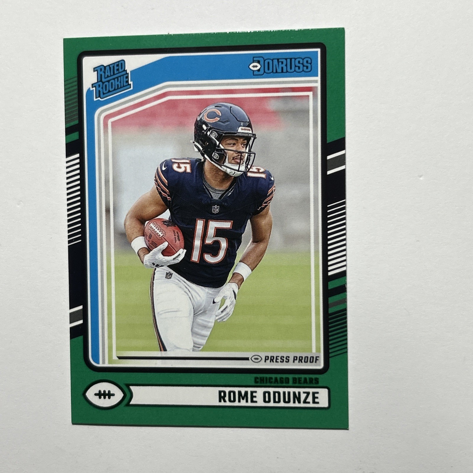 2024 Panini Donruss - Rated Rookie Rome Odunze #309 Press Proof Green (RC)