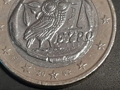 Pièces de 1 euro Greque de 2002 avec un S dans l'étoile du bas entre la date - Photo 1/2