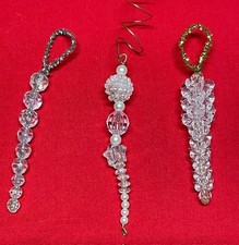 Plastic faceted beads, clear, iridescent, and white in various sizes