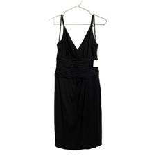 Calvin Klein NWT Black spaghetti strapped dress. Size 4. Perfect party dress.