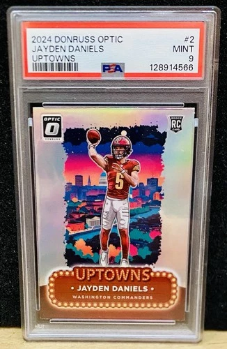 2024 Donruss Optic JAYDEN DANIELS RC PSA 9 Uptown Commanders