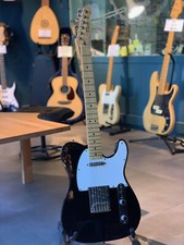 Fender Telecaster noir Mexico de 1992 avec son étui.