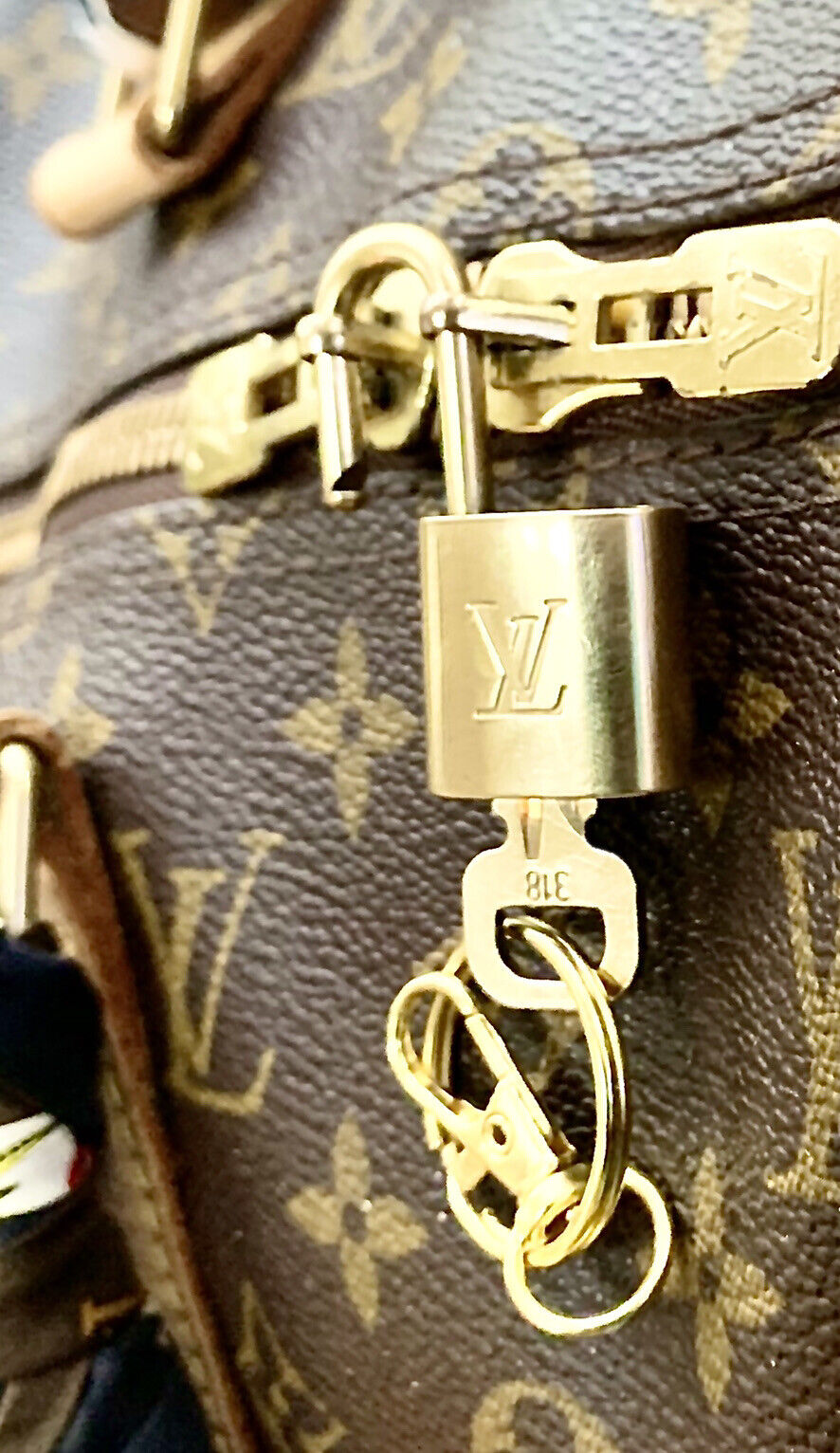 LOUIS VUITTON Brass Lock and Key Set 300943