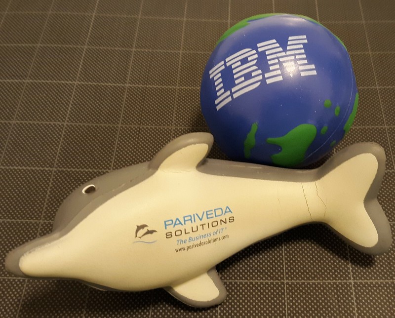 2 NEW squeeze cushions: IBM earth & dolphin (Information Technology companies)