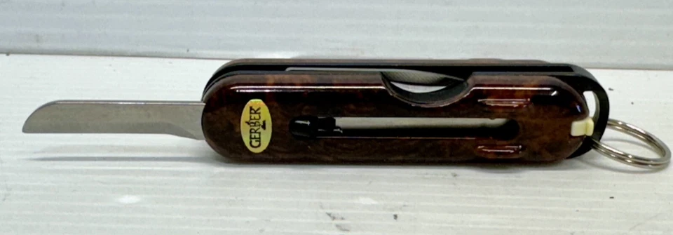 RELOJ BOLSILLO GERBER FISKARS VINTAGE LLAVERO CADENA CUCHILLO HERRAMIENTAS MULTI TIJERAS Foto 2 de 4