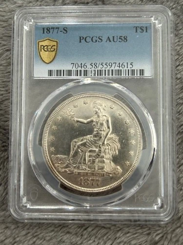 PCGS AU-58 1877-S SILVER TRADE DOLLAR. Looks UNC with beautiful luster.