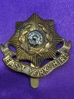 Genuine WW1/2 The East Yorkshire Regiment Bimetal Cap Badge w/slider