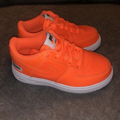 orange nike kids shoes
