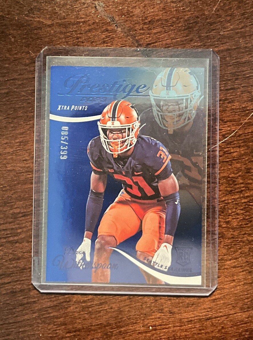 2023 Prestige Rookies Xtra Points Blue 058/399 Devon Witherspoon Seahawks RC