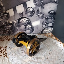 Vintage Decorative Metal Cannon Ornament Painted In Black And Gold