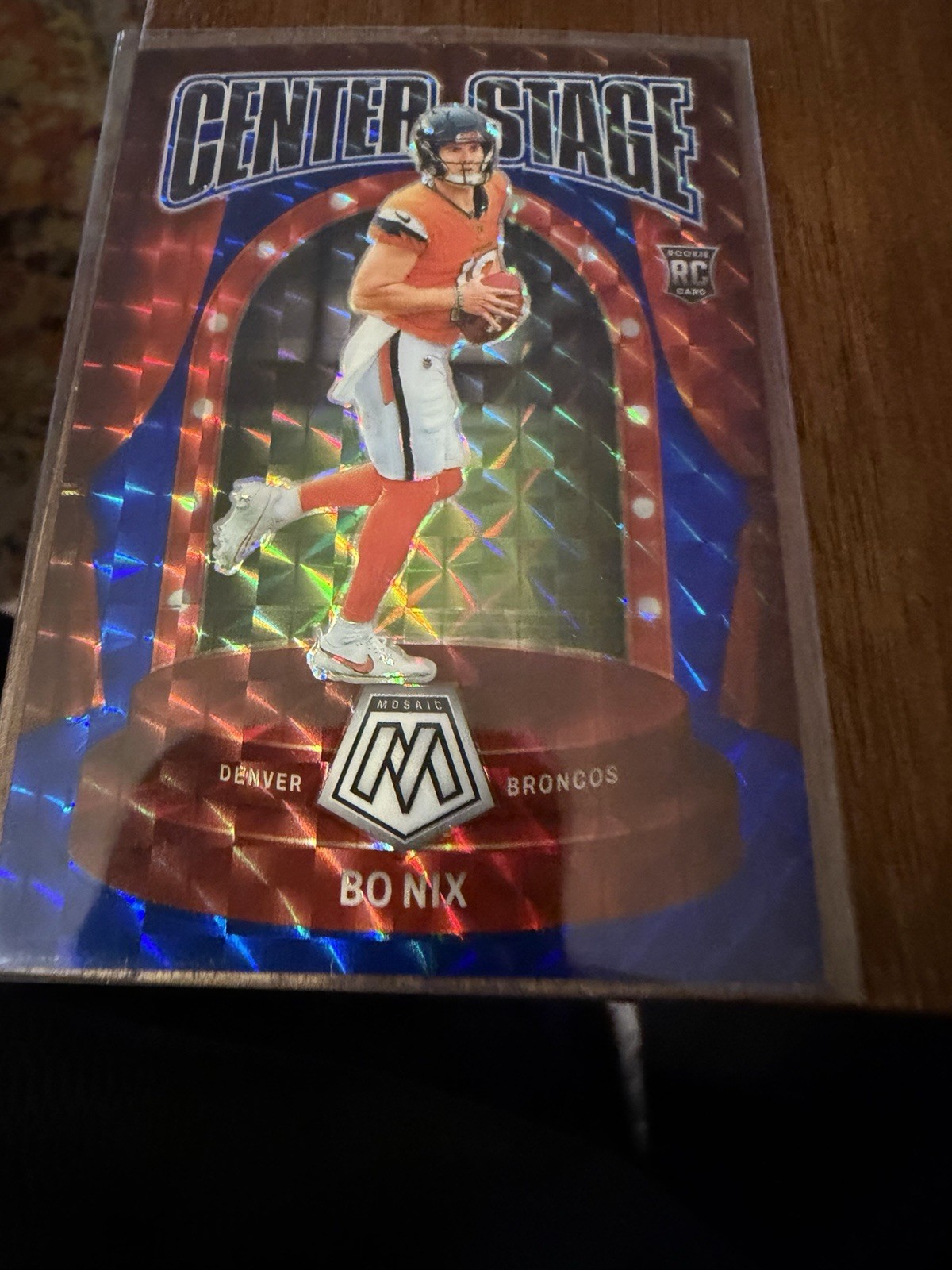 2024 Panini Mosaic - Center Stage Bo Nix #12 Blue Mosaic Prizm 63/99 (RC)