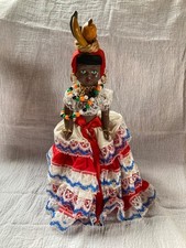vintage caribbean souvenir plastic doll with movable arms on a stand 10 inches