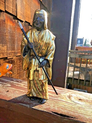 HEAVY CAST METAL GOLD AND BLACK MAN FIGURINE CARRYING A STICK  - ESTATE FIND 