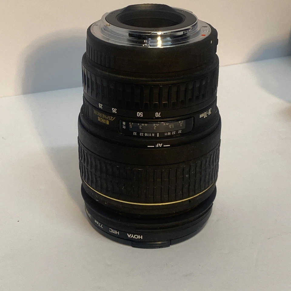 Lente zoom vintage Canon EOS D60 con Sigma AF-MF 28-70 mm F2,8 Ex asférica DF y + Foto 4 de 4