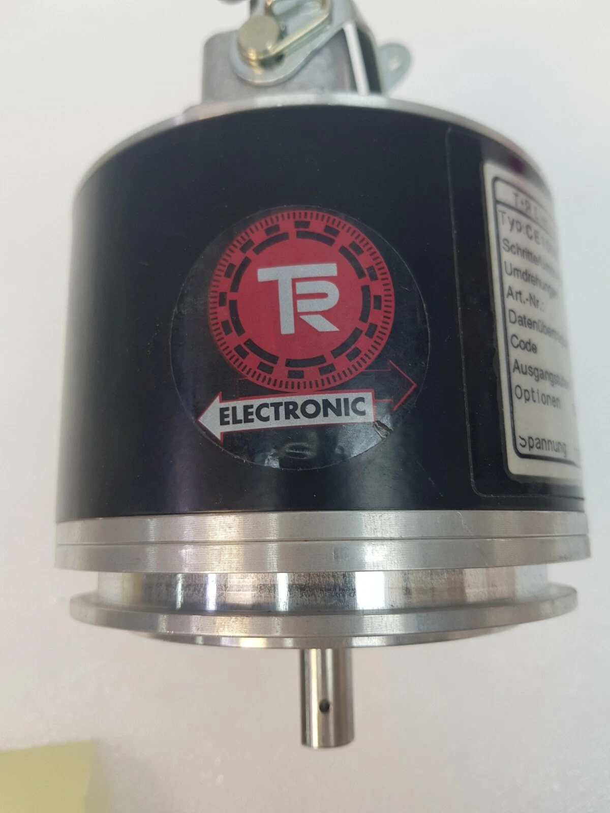 Red TR Electronic logo on the housing of the CE100M encoder