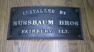 antique Cast iron Boiler plate advertising installed Nussbaum Bros