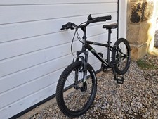 Rockrider ST500 Kids Mountain Bike. 20-inch. 6 Speed Gripshift.