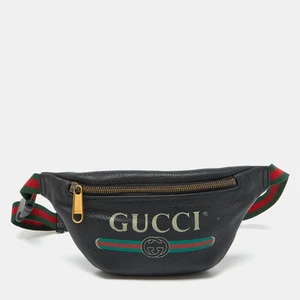 Sac ceinture Gucci cuir noir vintage logo toile