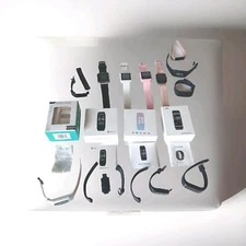 Lot of 12 Fitness Trackers watches Sold As Is For Parts or repair No chargers 