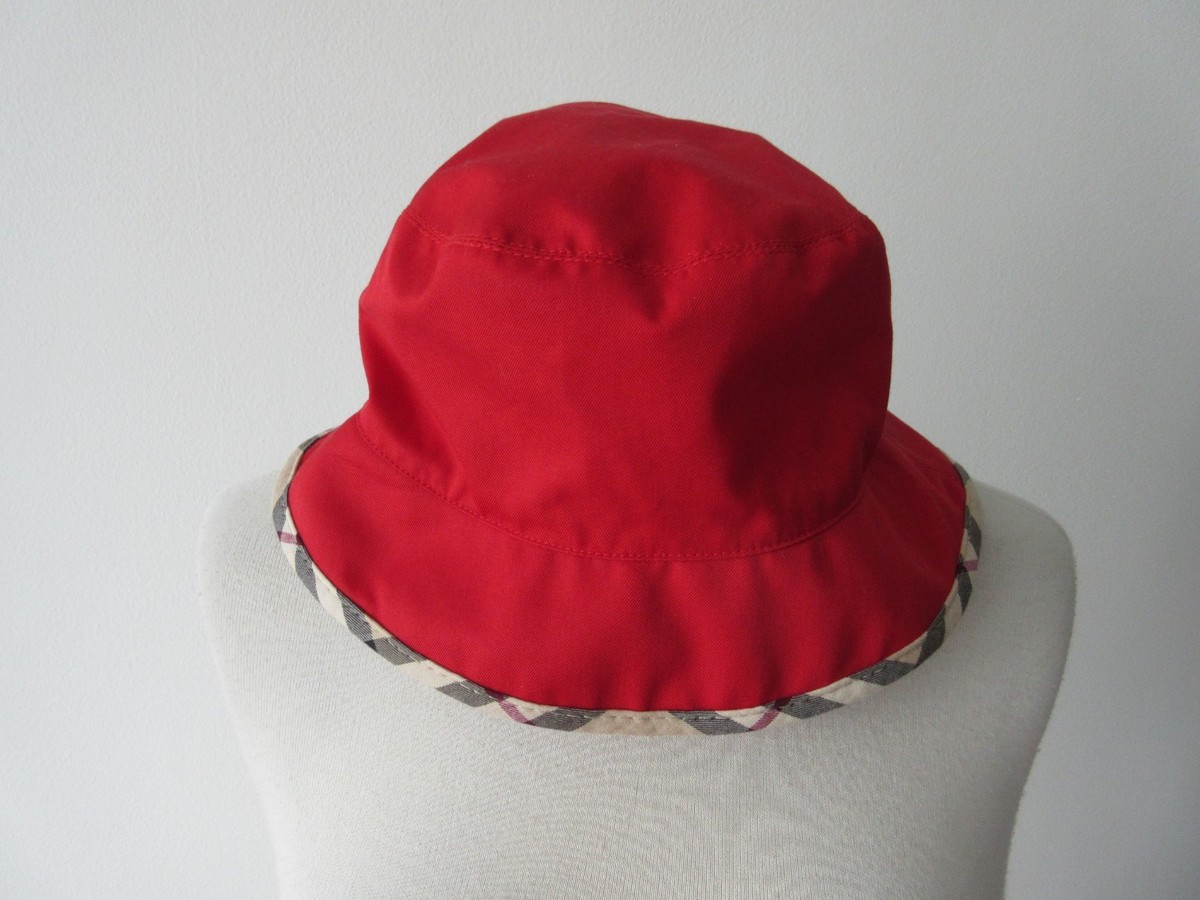 BURBERRY red cotton blend bucket hat with trim pattern made in
