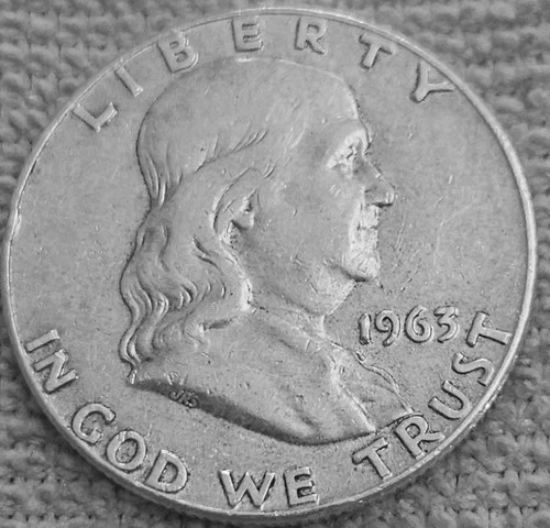 A Franklin half dollar 1963 D mint coins