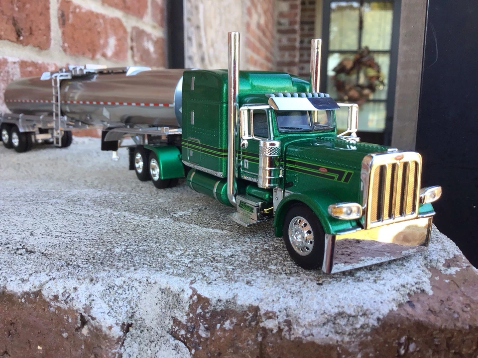 1:64 DCP 389Peterbilt Midroof W/Brenner Tanker FiganBaum Trans. - Image 2 of 4