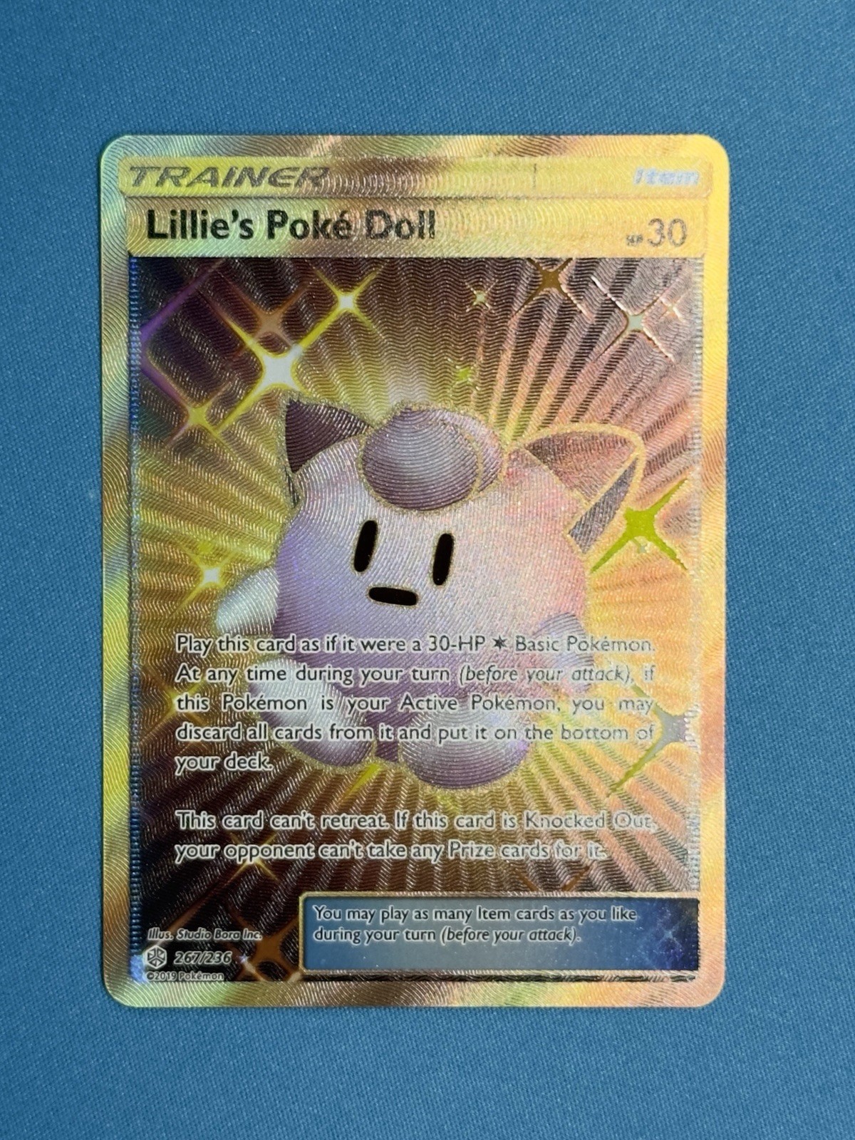Lillie's Poke Doll 267/236 Cosmic Eclipse Gold Secret Rare Trainer Card NM