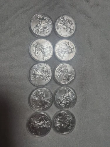 Lot Of 10 american eagle silver dollar uncirculated in Air-Tites