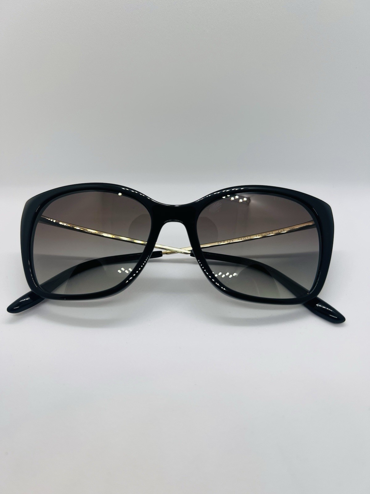 Prada SPR12X 1AB5Z1 Black Cateye Polarized Womens Sunglasses 54mm New