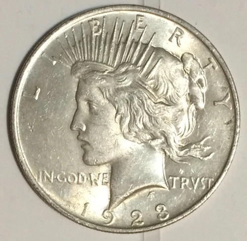 1923-P AU/BU Peace Silver Dollar, pictures are of the exact coin up for auction.