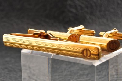 England brand ''Dunhill'' Gold color Cylindrical Cufflinks and Tie clip brand box.