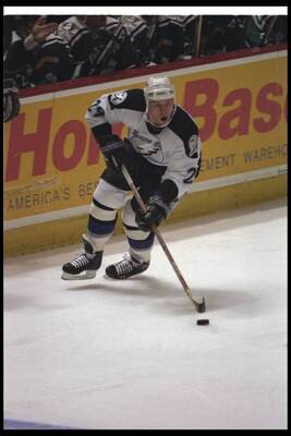 Rightwinger Alexander Selivanov Tampa Bay Lightning moves the puck- Old Photo