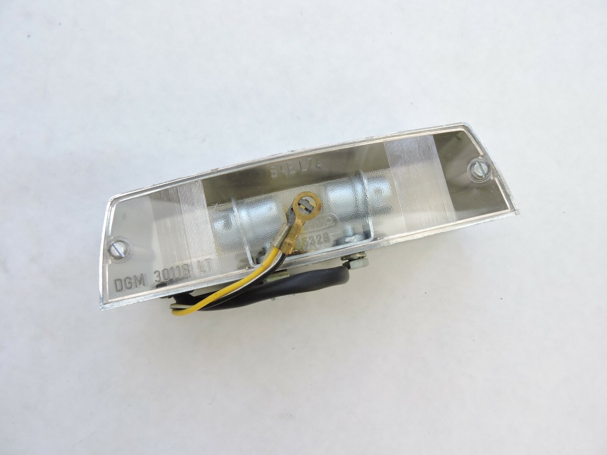 18745250 NOS Moto Guzzi License Plate Light W6692 | eBay