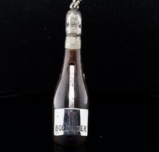 Rare Antique Bollinger Cigar Cutter Fob The form of a Champagne Bottle