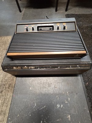 Atari 2600 Game Center Console w/ Controllers, Games, Power Adapter Pac-Man