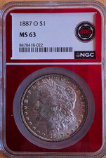 1887 O $1 NGC MS63 Silver Coin w/Beautiful toning around edges