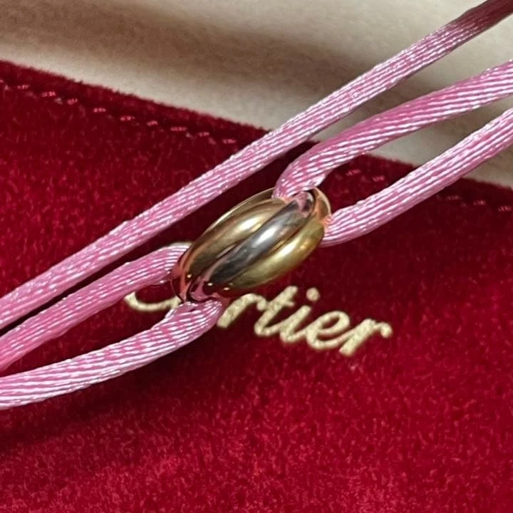 Pulsera Cartier Baby Trinity Oro Rosa Amarillo Blanco 18K Usada Foto 3 de 4
