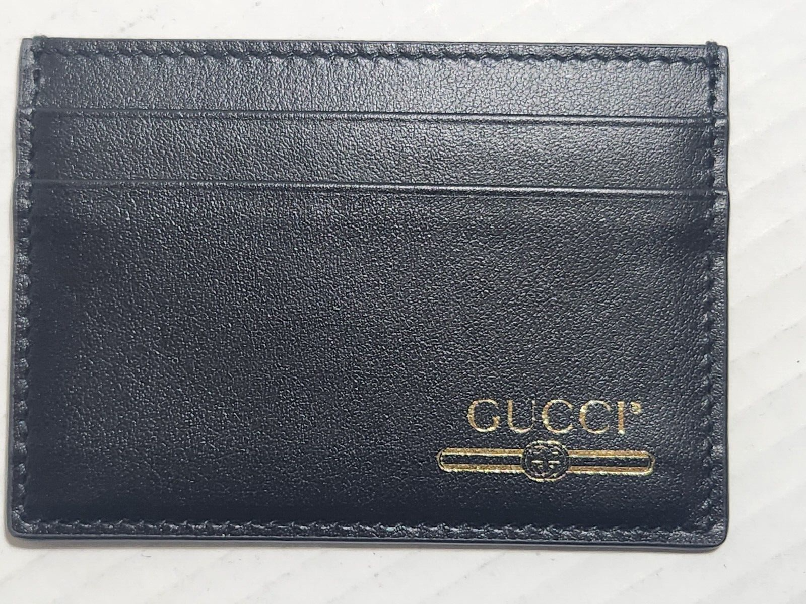Gucci Monogram Leather Card Holder in Black and Gold-image