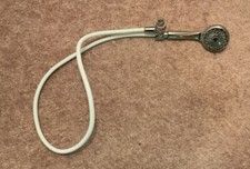 Used Moen Silver Adjustable Shower Head With White 60” Flexable Semi Rigid Hose