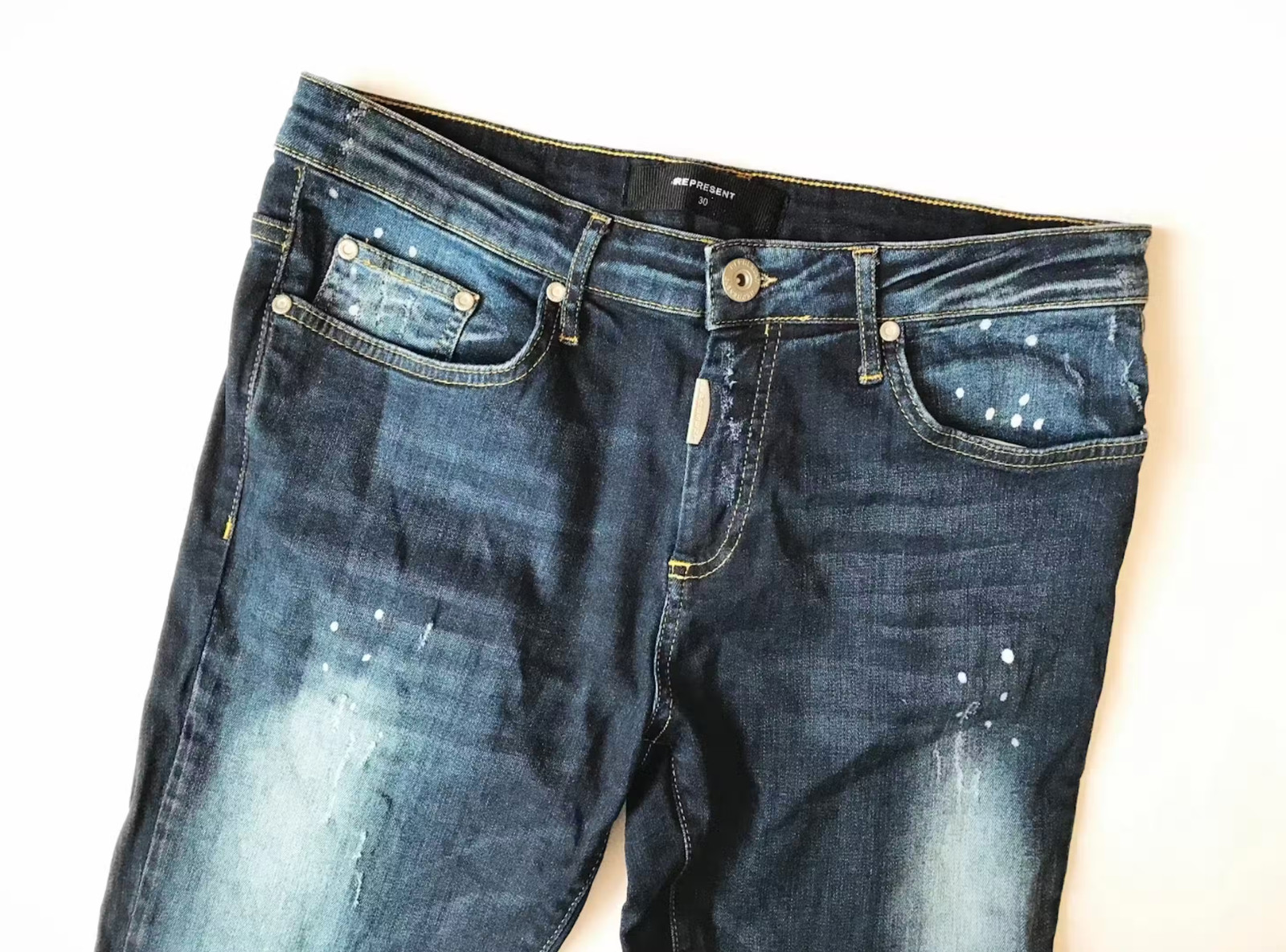 Represent essential distressed/painted skinny jea… - image 3