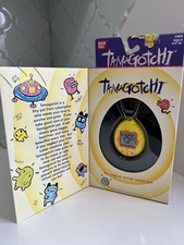 New in Box BANDAI Original 1996/1997 Tamagotchi Virtual Pet Yellow/ Orange 1800