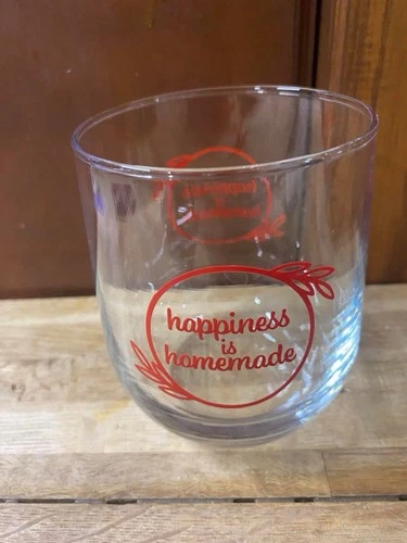 glass stemless wine glass has red 'happiness is homemade' graphic