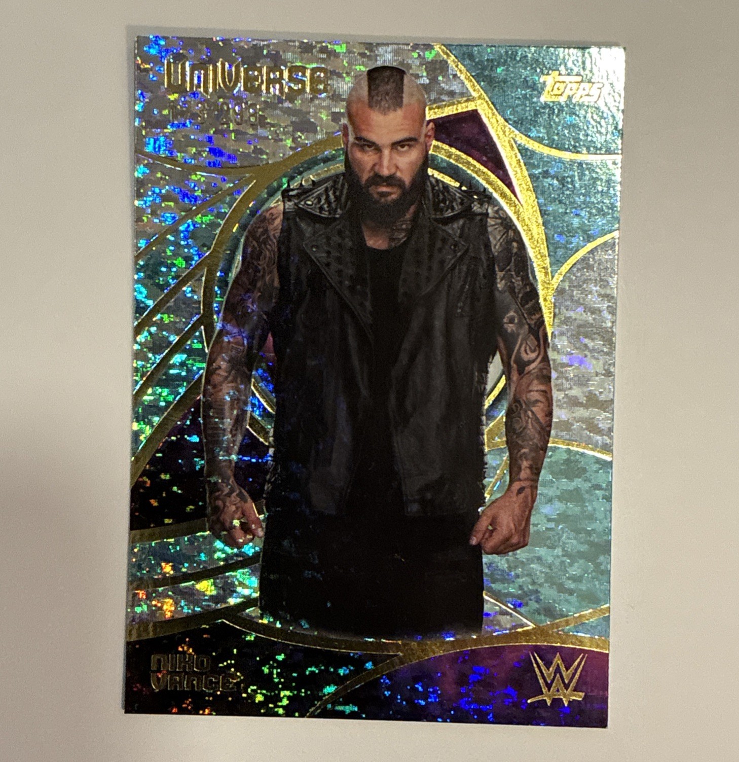 2026 Topps WWE Universe Niko Vance Rings #153 Aqua Sparkle /299