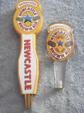 PAIR OF VINTAGE NEWCASTLE BEER TAP HANDLES (WOOD 11 1/2" & ACRYLIC 7")