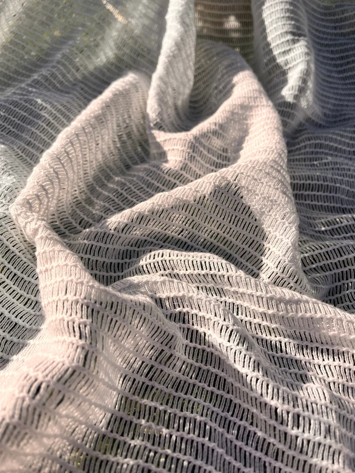 Tela orgánica suave de malla de algodón, patrón de cuadros blancos transparente por 2 metros Foto 2 de 4