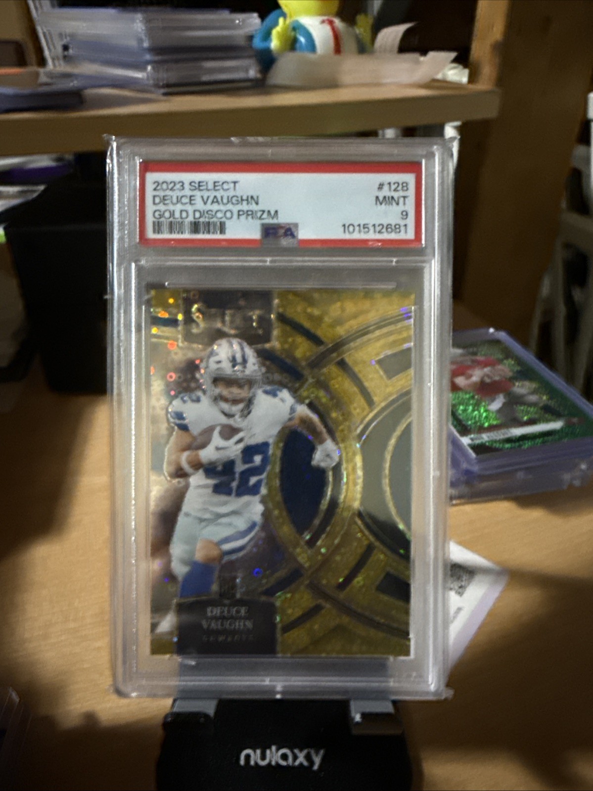 2023 Panini Select - Premier Level Deuce Vaughn #128 Gold Disco Prizm /10 (RC)