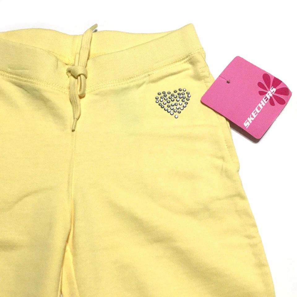 Pantalones deportivos Skechers para niñas talla 6 y 6X adornados ropa de juego algodón amarillo Foto 2 de 4